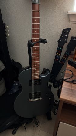 Epiphone dark blue guitar