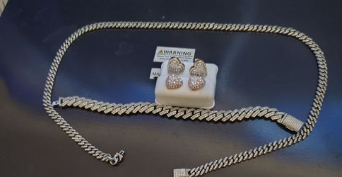 Iced  out moissanite  chain, bracelet, and earrings set.
