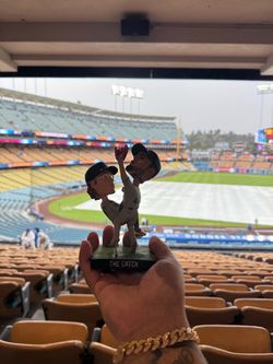 The catch bobblehead