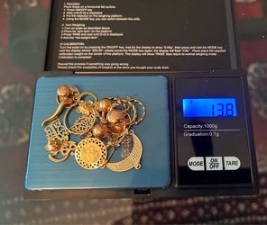 14kgold 13.8 grams.