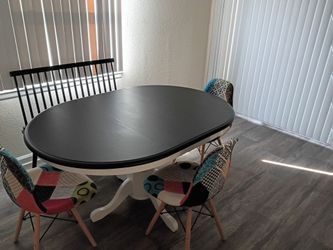 Black white and oval dining room table with leaflet $-125