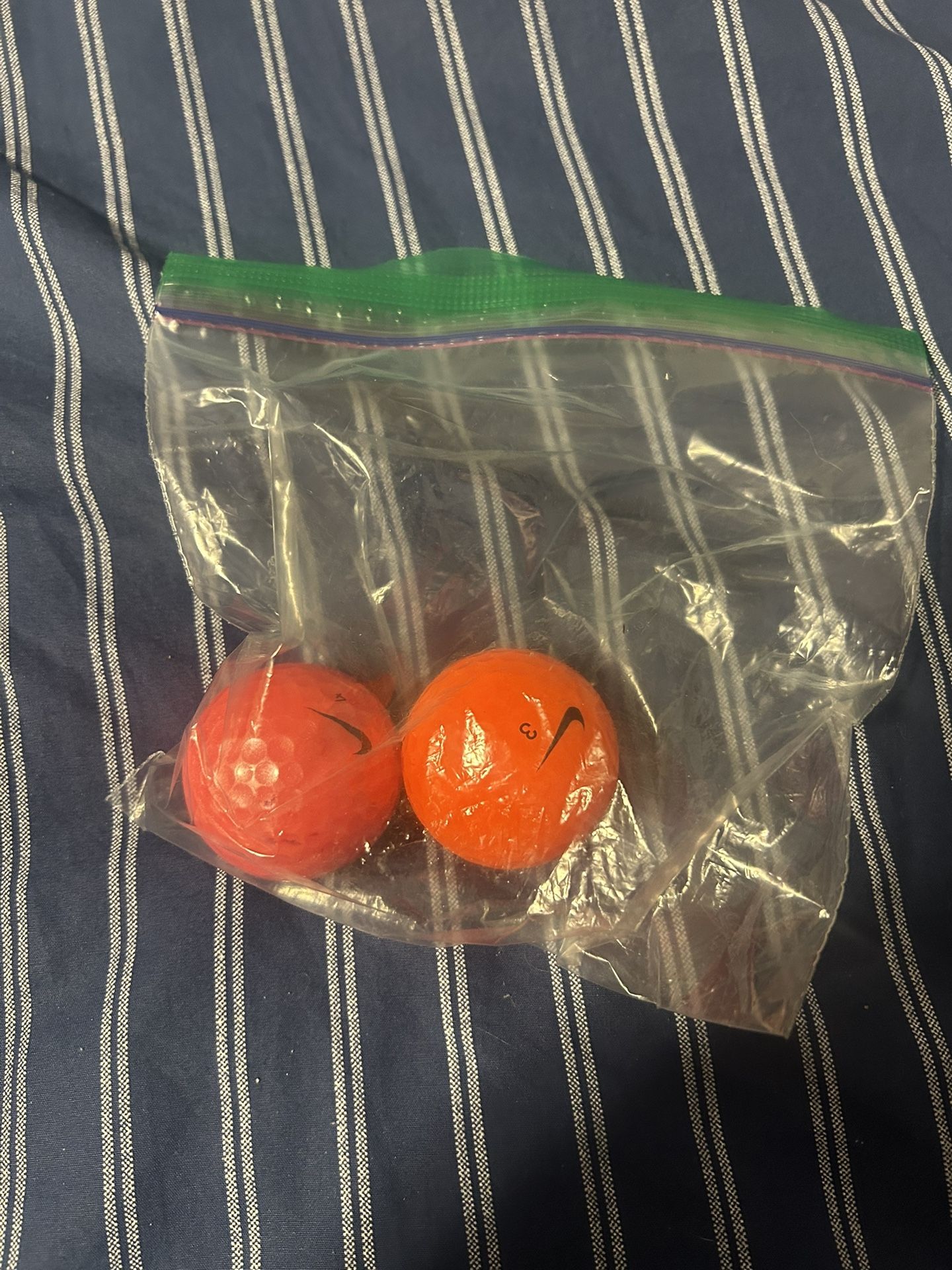 Nike 2 Different Colored Golf Balls 