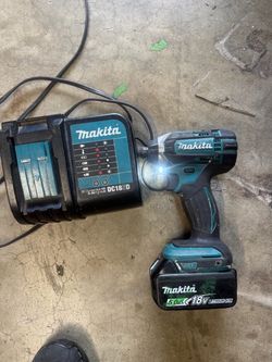 Makita impact.  Battery and charger
