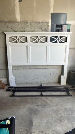 Basic bed frame with headboard for queen size mattress.