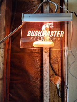 Lit plexiglass sighn Bushmaster Firearms