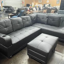 Black Leather Sectional with Storage Ottoman
