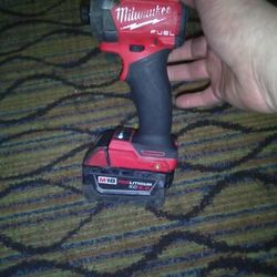 Milwaukee M18 fuel impact with red lithium xc 5.0 Battery
