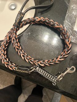 See Photo.  New Leather braided dog leash