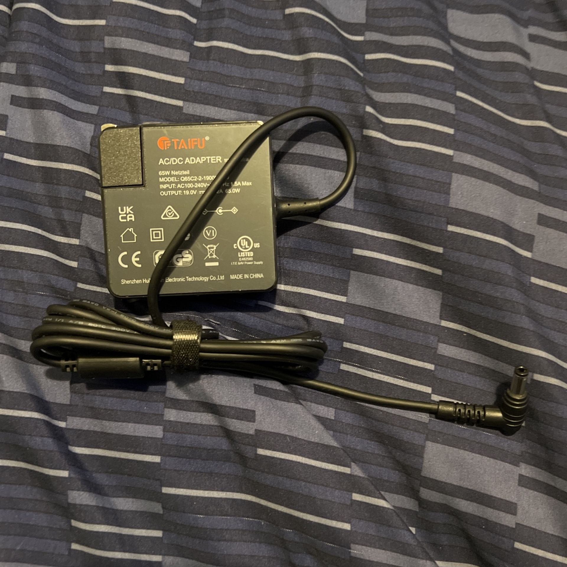 TAIFU AC/DC ADAPTER 65W Netzteil Model Q65C2/2/1(contact info removed)0