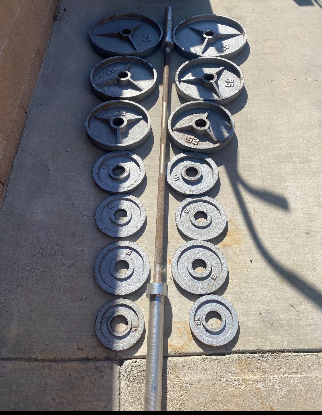 Complete Olympic weights Set 300 Pounds Total Including Bar