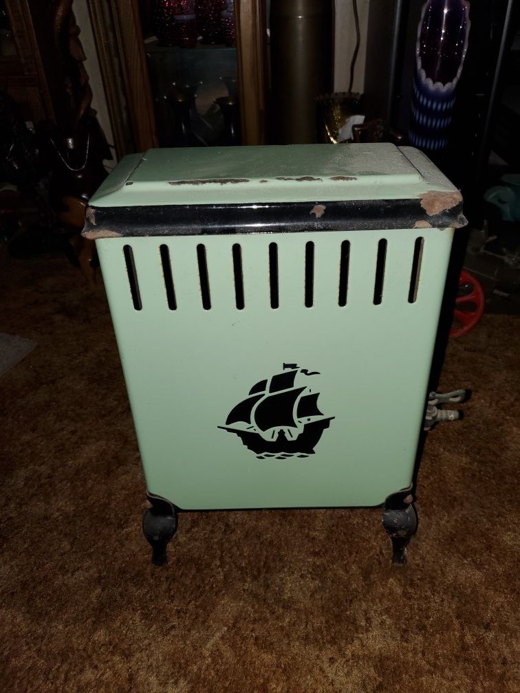 ANTIQUE room heater porcelian with.ship