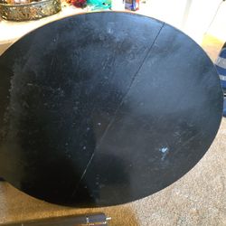 45" Across × 29"  high Round Table
