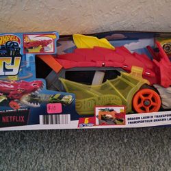 NEW IN BOX...HOT WHEELS DRAGON LAUNCH TRANSPORTER TOY...AGES 3+