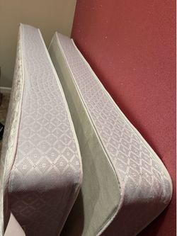 2 free twin mattresses.