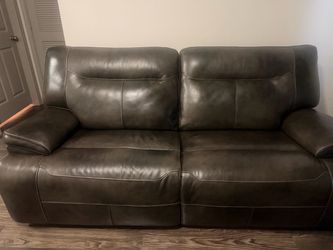 Brown Leather Reclining Sofa