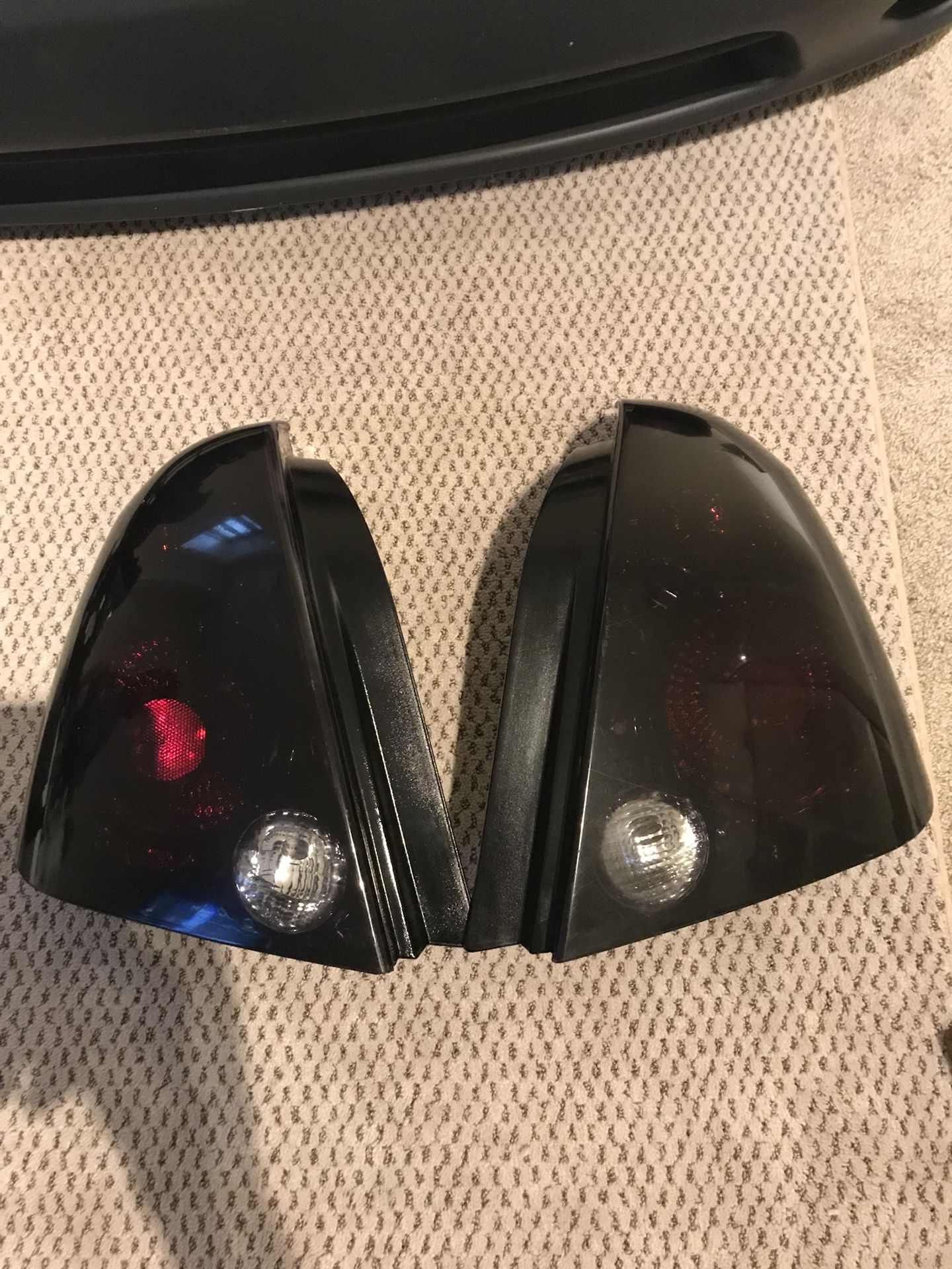 03 Nissan Altima front bumper and smoked tail lights