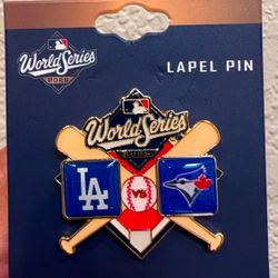 2025 World Series Dueling Lapel Pin featuring the logos of the Los Angeles Dodgers and the Toronto Blue Jays.