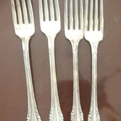 Four beautiful community silver triple plate forks