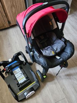 Doona Carseat w/Base & seat cover