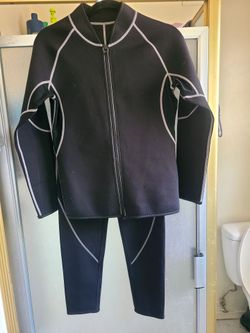Medium wetsuit. Never worn.