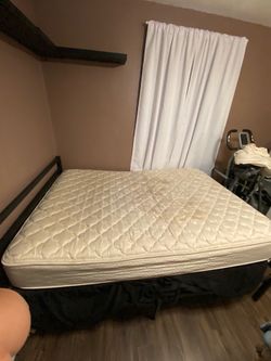 Full Size Mattress and Black bed frame