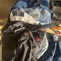 20 Pairs of jeans/pants Active, Ariat, Dickies, Wranglers, Levi’s