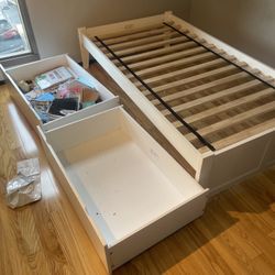 White twin bed with Rolling Storage