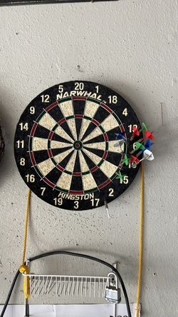 Dart board with darts