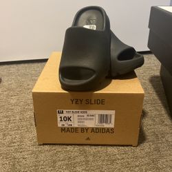 Size 10k Yeezy Slides . 