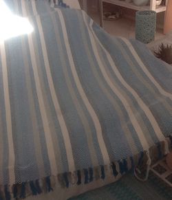 Teal/cream herringbone pattern throw like new