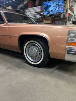 15 inch wheels rims tires hub caps cadillac