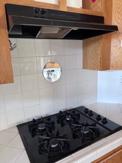 Oven , cook top, hood, fridge