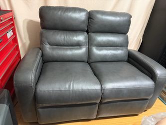 Leather Love seat double recliner
