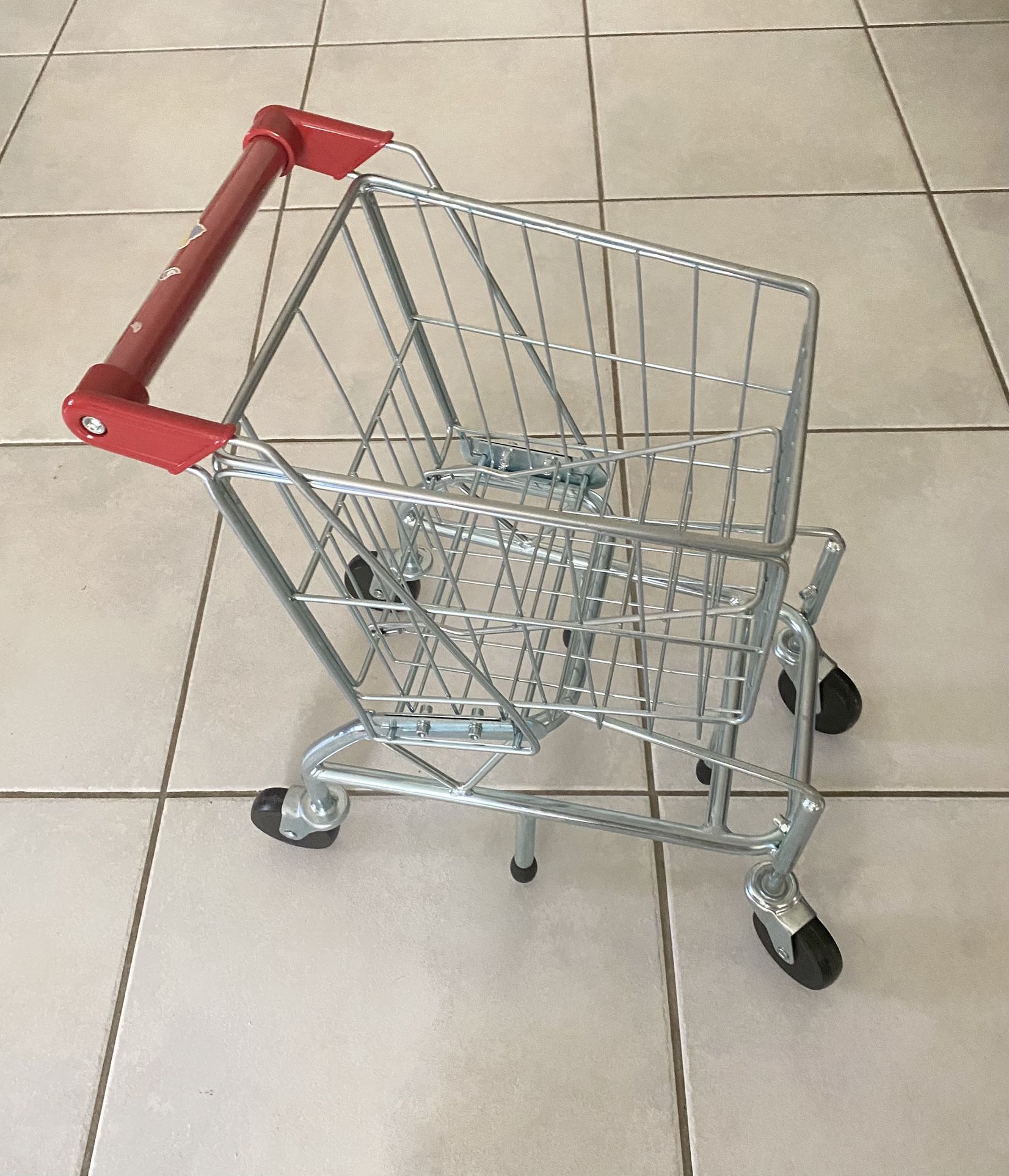 Toy Shopping Cart with a Sturdy Metal Frame. 