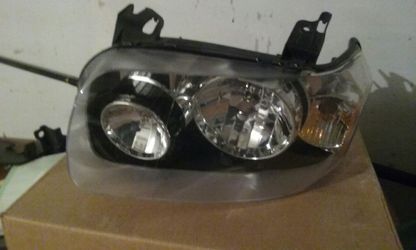 2007 Ford Escape left headlight