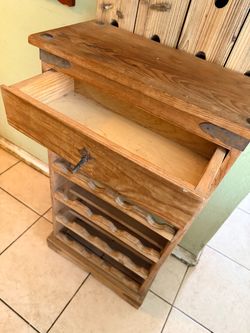 Solid pine wood *Sturdy and solid *Capacity for 16 wine bottles *1 drawer and wine glass hanging rack *Dimensions* (H39" W21" D10")