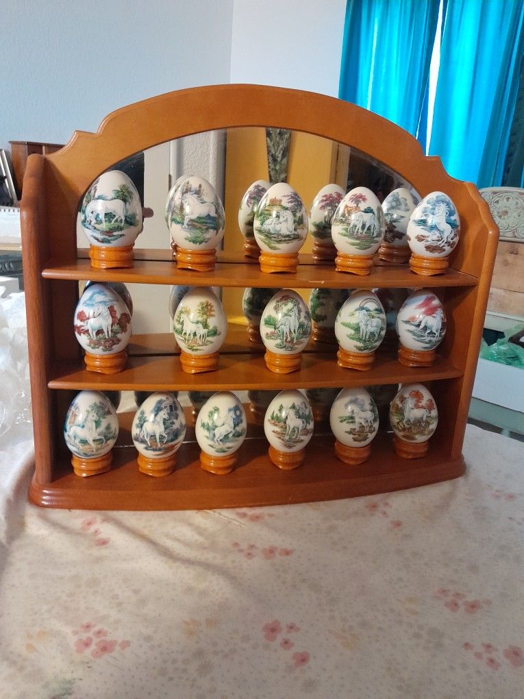 I TS AVAILABLE Vintage Princeton Galleries Porcelain Unicorn Eggs And Wood Mirrored Cabinet 