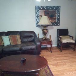 2 Leather Couches,1 End Table,1 Lamp,1 Leather Chair