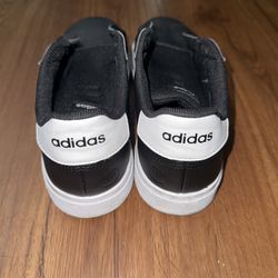 Adidas Grand Court in a black and white