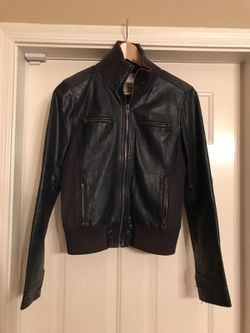 Lightly used Leather jacket Medium size. Dark teal.