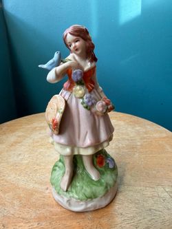 Vintage Girl with Bird Figurine