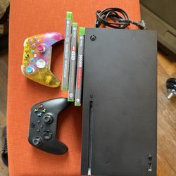 Xbox series x with 2 controllers 3 games
