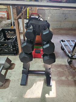 60lbs of rubber hex dumbbells with rack