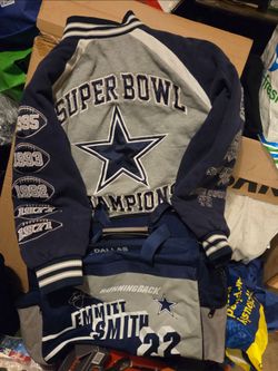 Dallas Cowboys Chanpionships and Emitt Smith bag..