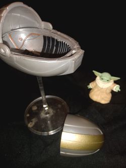 Star wars black series grogu with pram hover pod and clear stand.