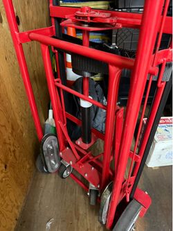 Appliance dolly w/ kick back wheels and stair track to help with stairs.