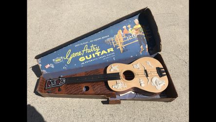 Vintage Gene Autry toy guitar