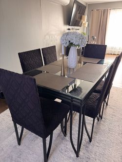 Glass dining table with 6 chairs