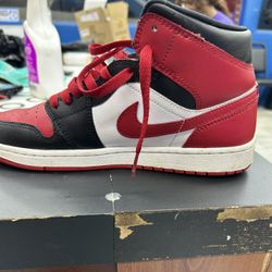 Air Jordan 1 Mid “Chicago / Bred Toe” style (red, black, white).