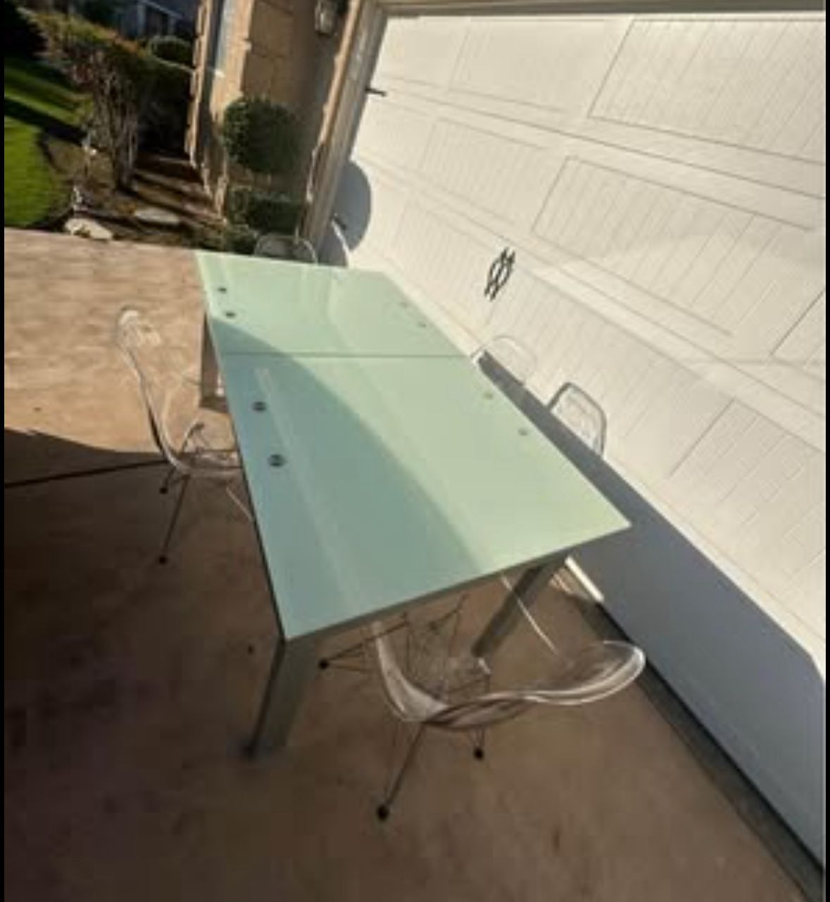 glass top dining table with clear chairs
